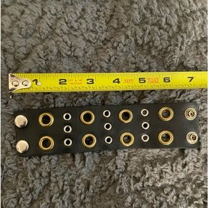 Melamed Leather grommet bracket